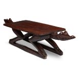 A LARGE HARDWOOD LOW TABLE MODELLED AS ADORSED CROCODILES