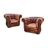 A PAIR OF BROWN LEATHER BUTTON UPHOLSTERED ARMCHAIRS