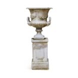 A PAIR OF WHITE PAINTED STONE COMPOSITION CAMPANA URNS