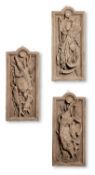 A SET OF THREE TINTED PLASTER TROPHY PANELS