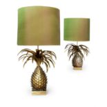 A PAIR OF LARGE GILT METAL ANANAS TABLE LAMPS ATTRIBUTED TO MAISON JANSEN
