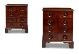 A PAIR OF MAHOGANY BEDSIDE CHESTS OF DRAWERS