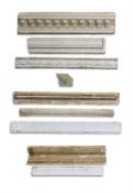 A COLLECTION OF EIGHT PLASTER ARCHITECTURAL MOULDINGS