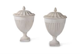 A PAIR OF PLASTER MODELS OF URNS
