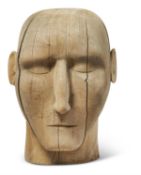 AN OVER LIFE-SIZED CARVED WOODEN HEAD, 20TH CENTURY