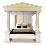 A LARGE WHITE PAINTED FOUR POSTER BED