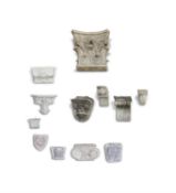 A COLLECTION OF TWELVE ASSORTED PLASTER ARCHITECTURAL MOULDINGS