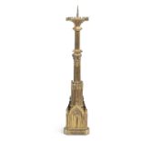A LARGE GILT METAL GOTHIC REVIVAL CANDLESTICK