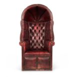 A RED LEATHER BUTTON UPHOLSTERED PORTER'S CHAIR