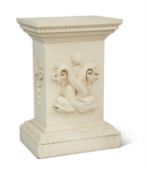 A WHITE PAINTED WOOD PEDESTAL