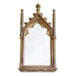 A GOTHIC REVIVAL CARVED OAK, PAINTED AND PARCEL GILT WALL MIRROR