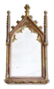 A GOTHIC REVIVAL CARVED OAK, PAINTED AND PARCEL GILT WALL MIRROR