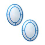 A PAIR OF BLUE AND CLEAR GLASS VENETIAN MARGINAL WALL MIRRORS, BY A MODERN GRAND TOUR