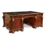 A CARVED MAHOGANY TWIN PEDESTAL PARTNERS DESK, IN GEORGE III STYLE