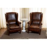 A PAIR OF LEATHER WING BACK CHAIRS, 20TH CENTURY