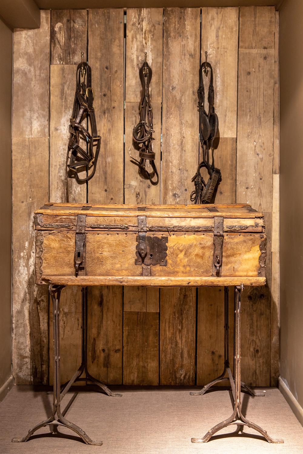 AN IRON AND WOODEN BOUND DOMED CHEST, LATE 17TH/EARLY 18TH CENTURY