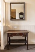 A GEORGE III OAK SIDE TABLE WITH THREE DRAWERS