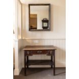 A GEORGE III OAK SIDE TABLE WITH THREE DRAWERS