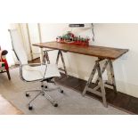 A PLANKED OAK AND CHROME TRESTLE DESK, MODERN