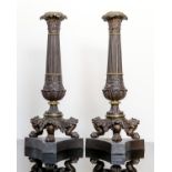 A PAIR OF GILT BRASS CANDLESTICKS IN GOTHIC REVIVAL TASTE19TH CENTURY