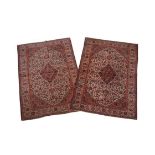 A pair of Kashan rugs