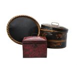 A Regency and black and parcel gilt painted tinware hat box