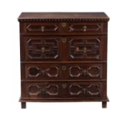 A Charles II oak chest of drawers