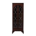 A mahogany display cabinet