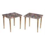 A pair of mottled pink and black marble mounted gilt metal side tables or stands