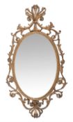 A George III giltwood and composition oval wall mirror
