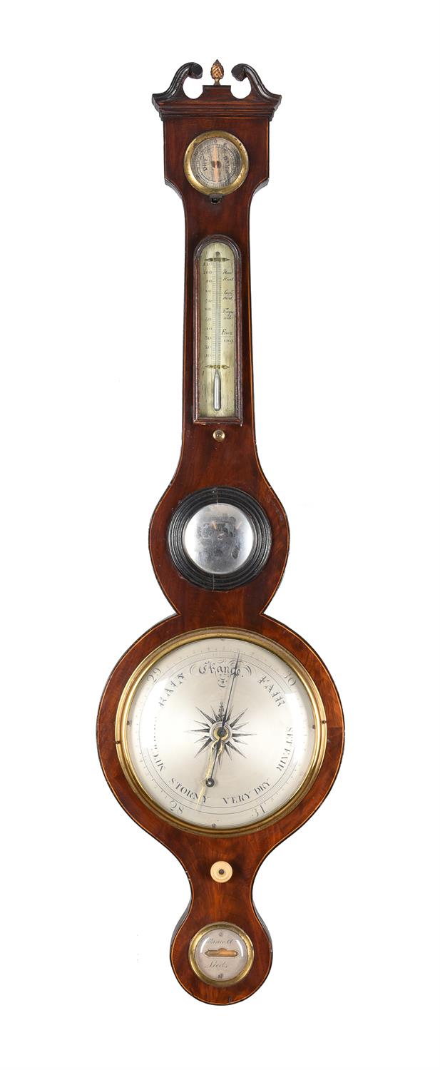 A mahogany and line inlaid wheel barometer
