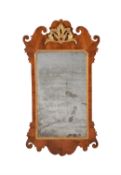 A George II walnut and parcel gilt wall mirror