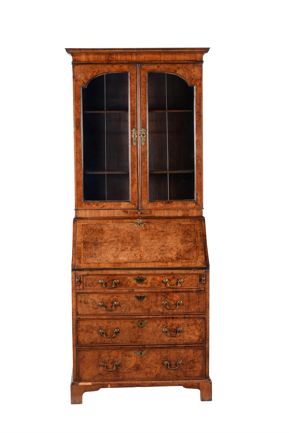 A George II walnut and feather banded bureau bookcase