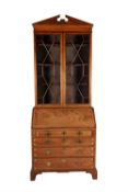 A mahogany bureau bookcase