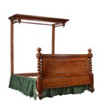 A Victorian mahogany half tester bed