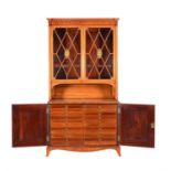 A Victorian satinwood collectors cabinet bookcase
