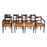 A set of six Regency mahogany and brass line inlaid dining chairs