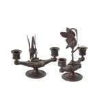 A pair of Italian bronze candle holders