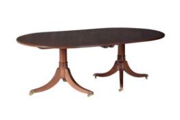 A mahogany twin pedestal dining table