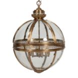 A bronzed metal and glazed 'globe' lantern or porch light