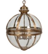 A bronzed metal and glazed 'globe' lantern or porch light