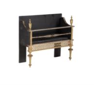 An iron and brass mounted fire grate in Regency taste