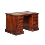 A Victorian mahogany twin pedestal desk