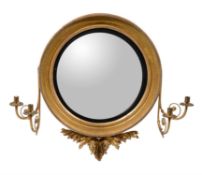A Regency giltwood convex wall mirror