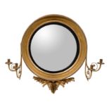 A Regency giltwood convex wall mirror