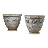 A pair of large lead garden urns