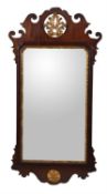 A George II fret frame wall mirror