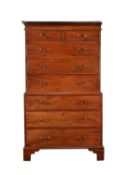 A George III mahogany and inlaid chest on chest