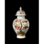 A Dresden porcelain baluster vase and cover