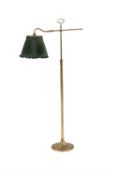 A brass adjustable standard lamp